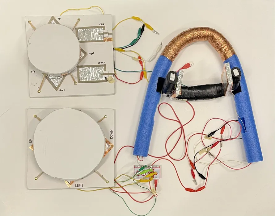 Custom adaptive controller made with Makey Makey, foam handles, foil pads, and alligator clip wires